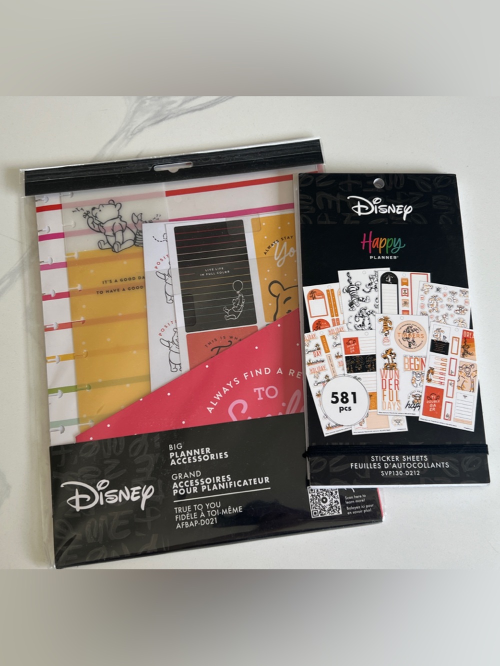 The Happy Planner Winnie the Pooh and Tigger organizers and stickers